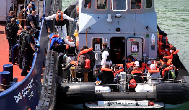 A group of people thought to be migrants are brought in to Dover, Kent, following a small boat incident in the Channel