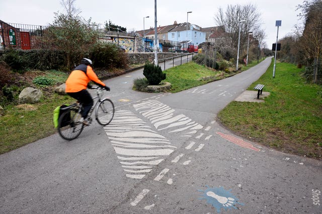 Stock image of a cyclist at a zebra crossing across the Bristol & Bath railway path near Easton, Bristol (Ben Birchall/PA)
