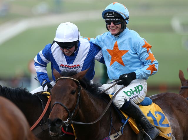 Paul Townend aboard Un De Sceaux congratulates Bryony Frost