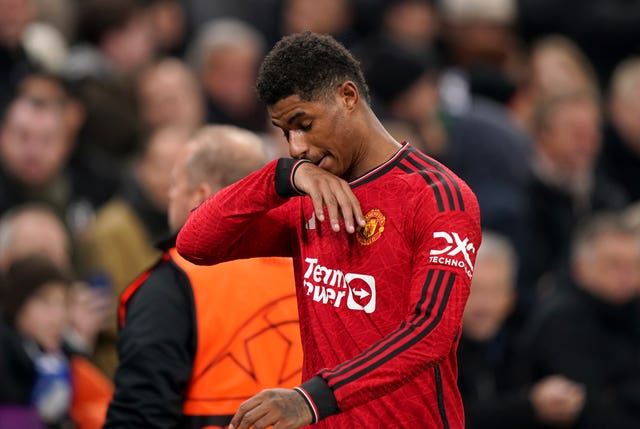 Marcus Rashford walks off the pitch after being shown a red card