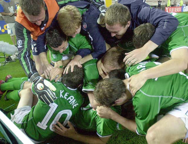 Republic of Ireland striker Robbie Keane (left) is mobbed by team-mates after his last-gasp equaliser against Germany