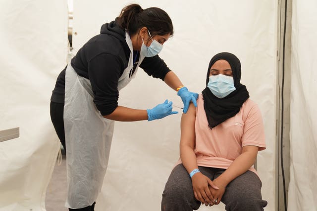 Woman is vaccinated