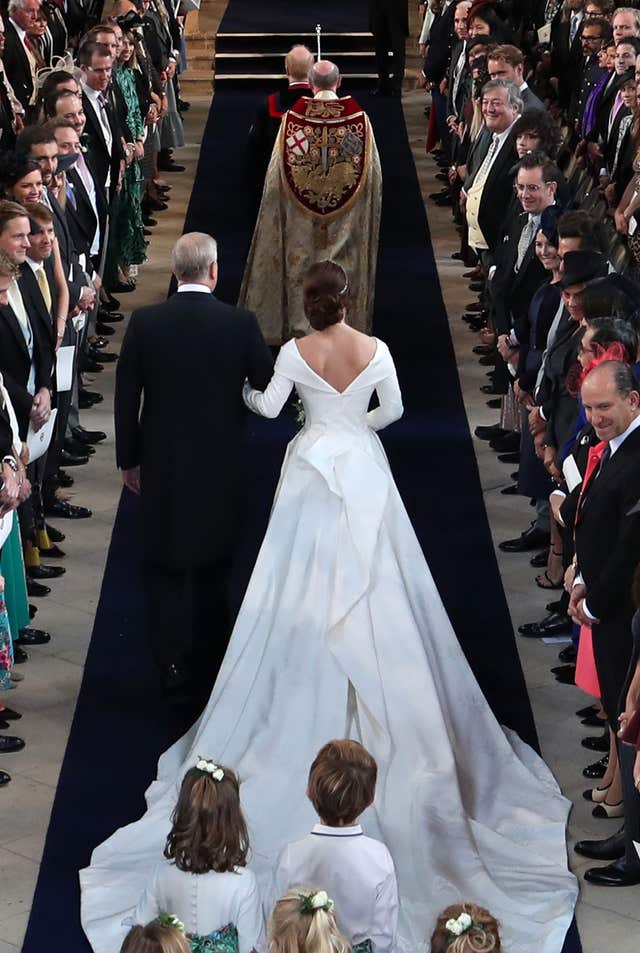 The Duke of York walks his daughter Princess Eugenie down the aisle for her wedding to Jack Brooksbank at St George's Chapel in Windsor Castle (Danny Lawson/PA)