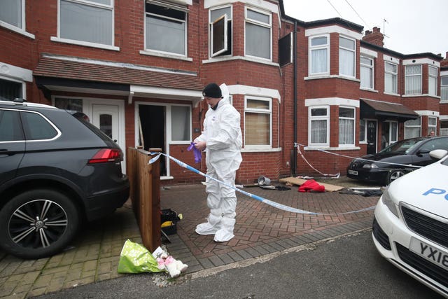 Police said officers remain on the scene they work to establish the cause of the fire (Danny Lawson/PA Wire)