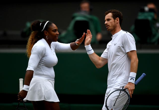 Andy Murray and Serena Williams high five on Centre Court