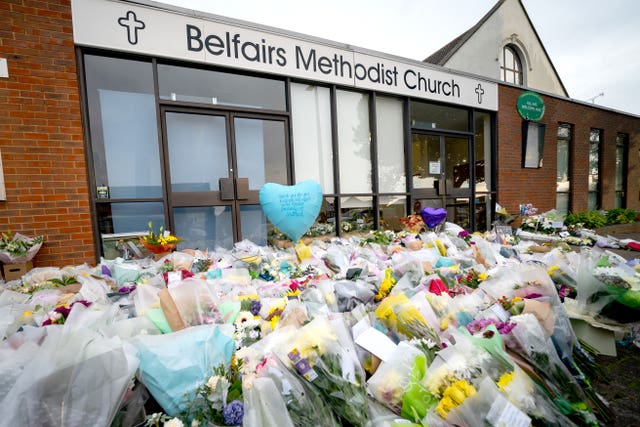 Flowers and tributes at the scene near Belfairs Methodist Church in Eastwood Road North, Leigh-on-Sea, Essex, where Conservative MP Sir David Amess died after he was stabbed several times at a constituency surgery