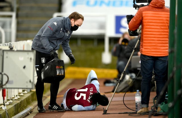 Aston Villa’s Bertrand Traore hurt himself after going over the top of the advertising hoardings