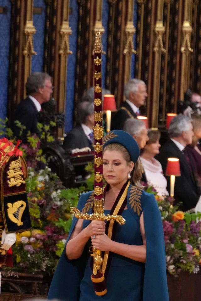 Penny Mordaunt carrying the Sword of State at the coronation