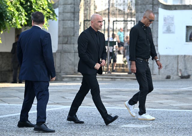 Portugal national team manager Roberto Martinez arrives at the funeral