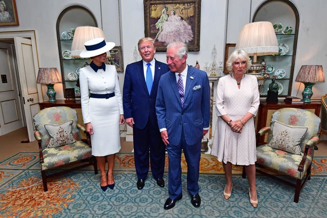 US President Donald Trump and his wife Melania at Clarence House with the Prince of Wales and Duchess of Cornwall