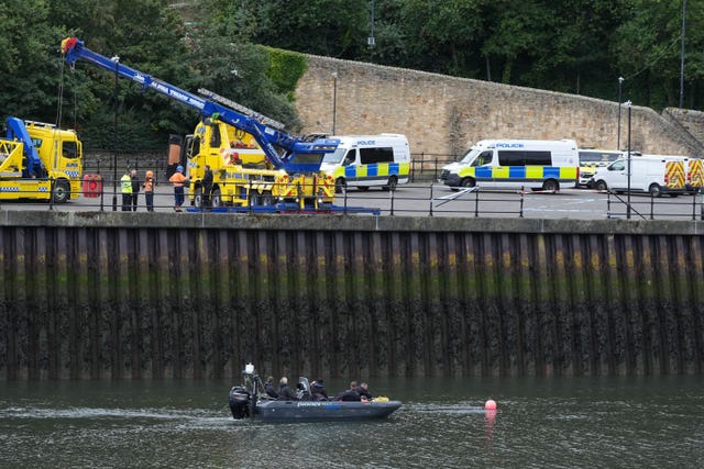 Police divers at the scene on the River Wear