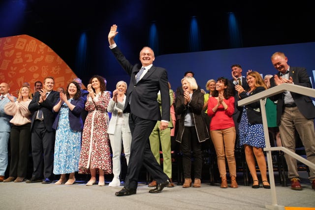 Liberal Democrat leader Sir Ed Davey arriving on stage to give his keynote speech at the party’s autumn conference