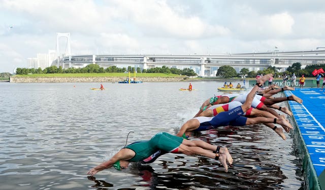 The triathlon begins following a false start 