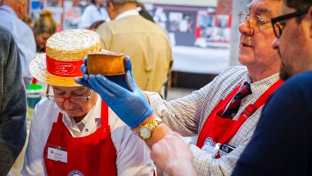Judges inspecting pies