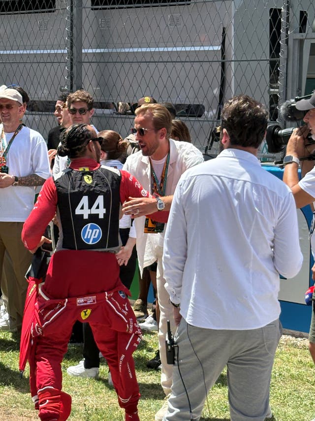 Lewis Hamilton greets England skipper Harry Kane before the race in Barcelona