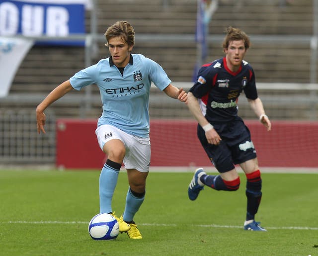 Denis Suarez, left, had a spell at Manchester City earlier in his career