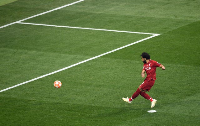 Mohamed Salah scores the opening goal from the penalty spot