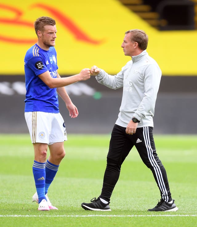 Leicester boss Rodgers (right) says others have to share the goalscoring burden