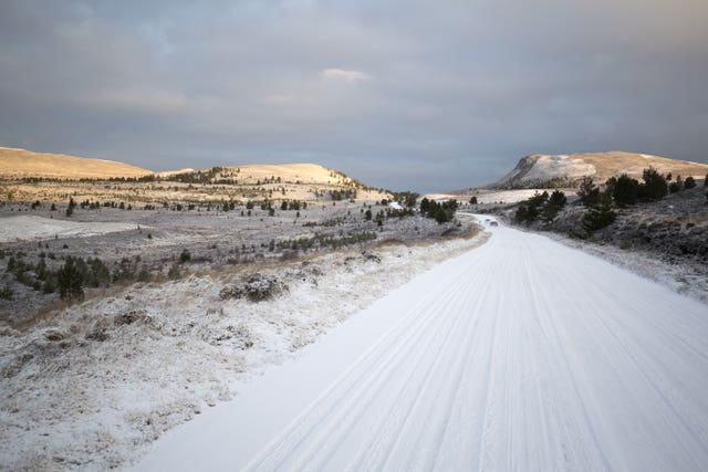 Snow covers the B9007 between Carrbridge and Forres in the Cairngorms National Park