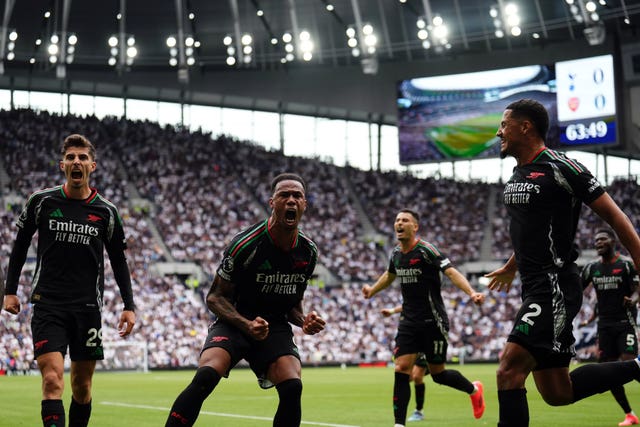 Arsenal players celebrate Gabriel''s goal at Tottenham