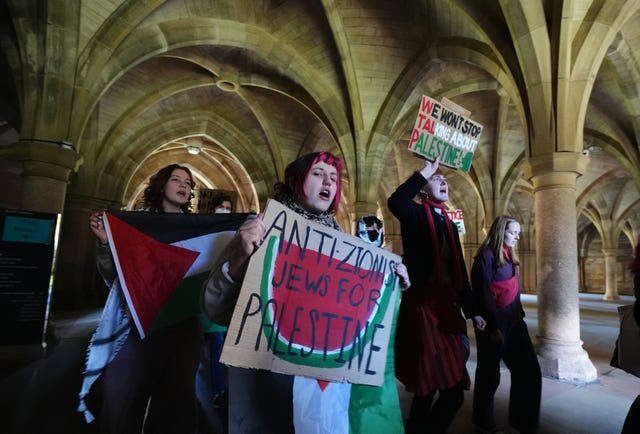 People take part in a pro-Palestine protest at the University of Glasgow