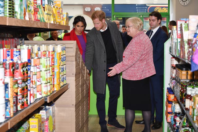 The Duke and Duchess of Sussex are shown around the supermarket