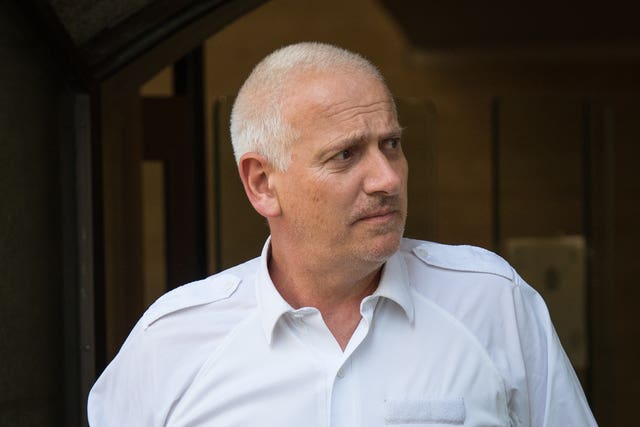 PC Ian Midgley leaves the Old Bailey after giving evidence