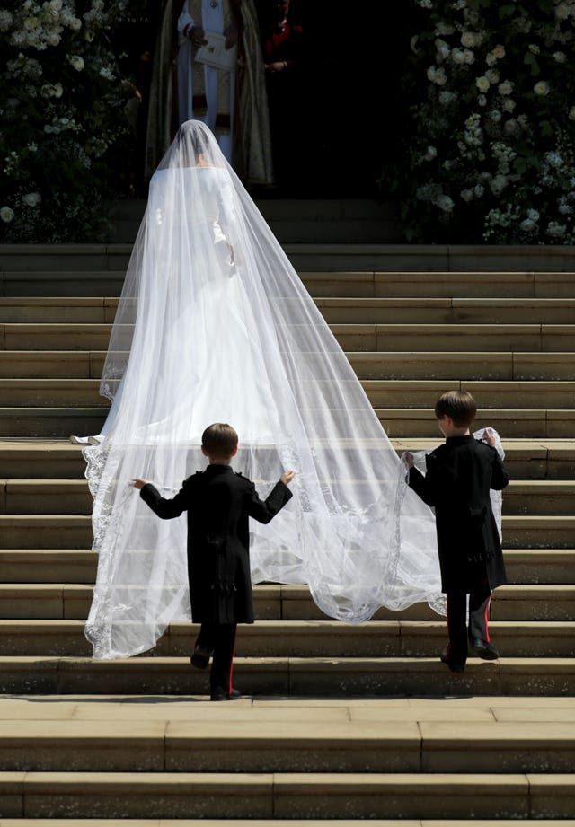 Meghan's veil, pictured on the duchess' wedding day, can be seen in all its glory at the exhibition. Jane Barlow / PA Wire