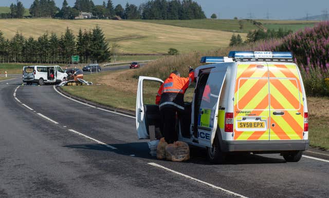 Police at the scene on the A96 between Huntly and Keith in Moray