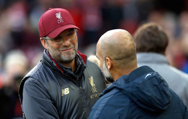 Jurgen Klopp (left) and  Pep Guardiola are preparing to go head-to-head once again