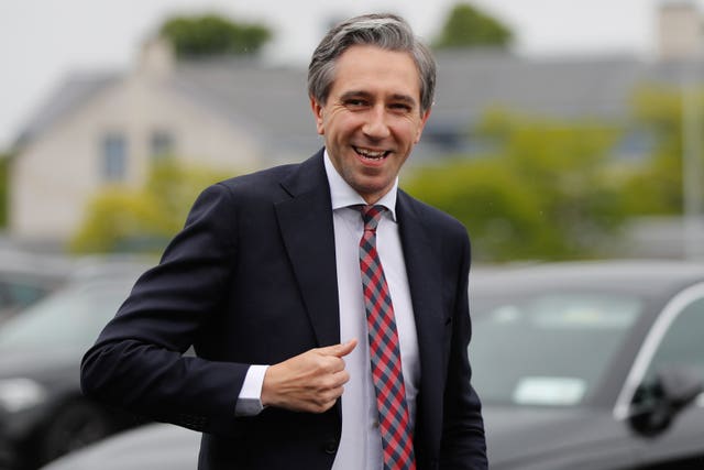 Taoiseach Simon Harris smiles