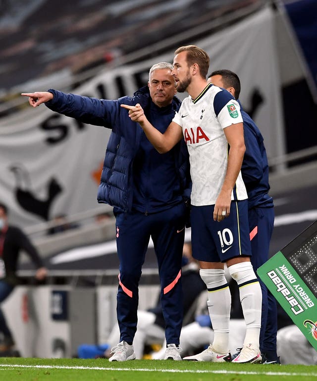 Harry Kane, right, remains in contact wit former Tottenham manager Jose Mourinho
