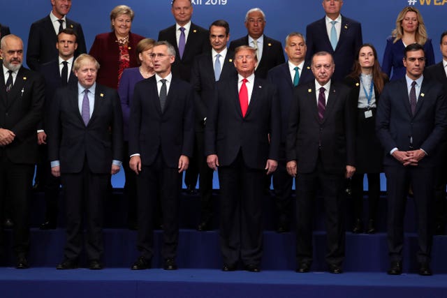 Nato leaders pose for a photograph during the annual summit