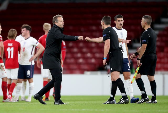 Kasper Hjulmand (left) picked up his first competitive win as Denmark boss with the victory over Iceland. 