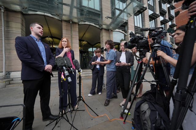 Dr Ross Nieuwoudt and Dr Melissa Ryan outside Portcullis House