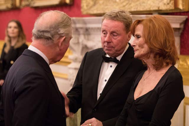 Charles speaks to Harry Redknapp and his wife Sandra (John Phillips/PA)