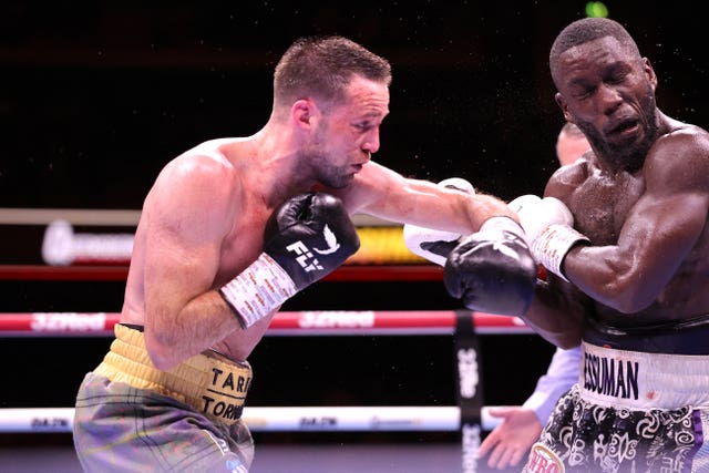 Josh Taylor punches Ekow Essuman