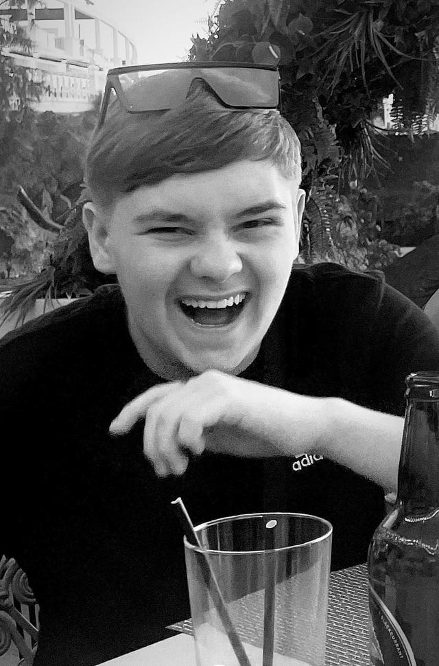 Handout black and white photo of Harvey Willgoose laughing