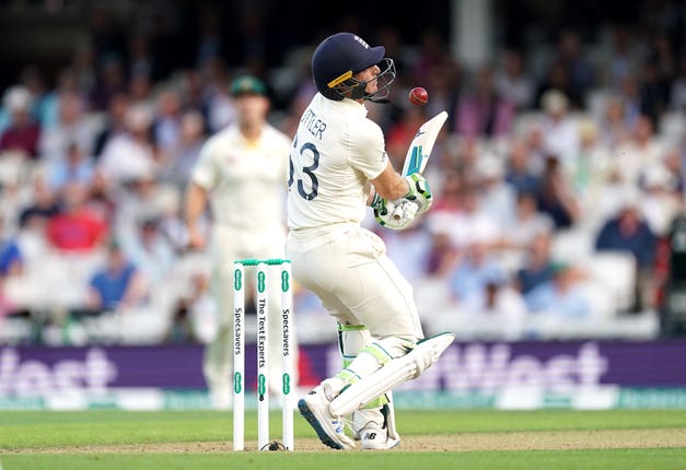 Jos Buttler is hit by the ball while batting against Australia