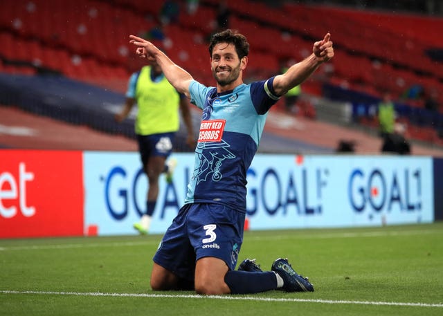 Joe Jacobson celebrates scoring the winner from the penalty spot