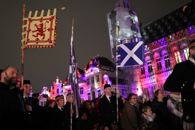 Members of the Celtic Passion Pipe Band playing in Grand-Place, Brussels
