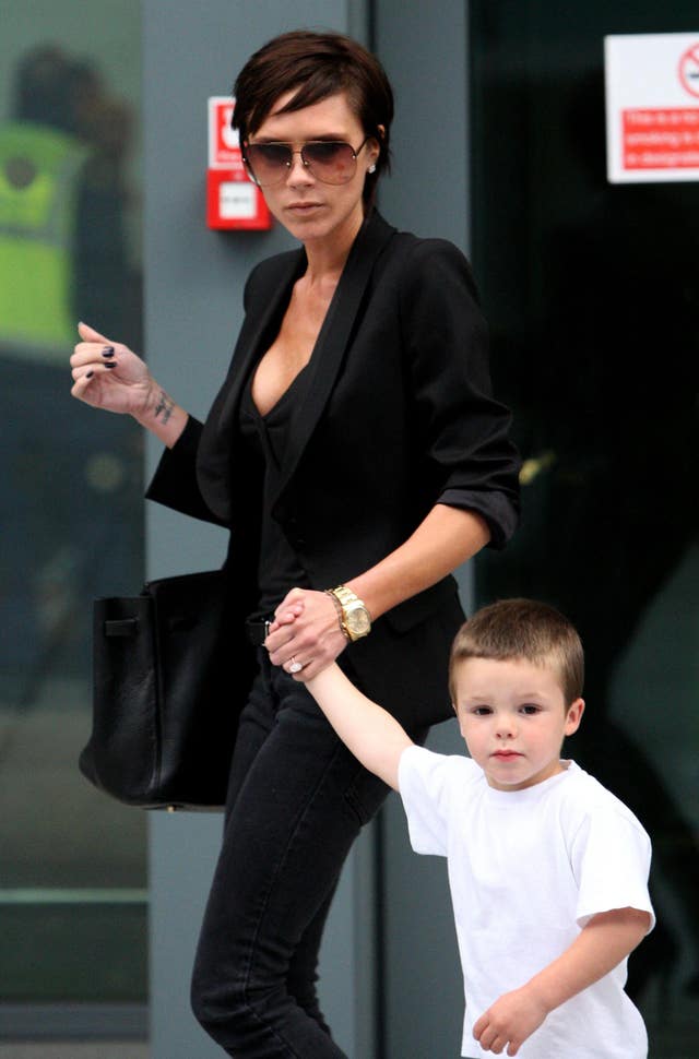 Victoria Beckham and sons at Heathrow
