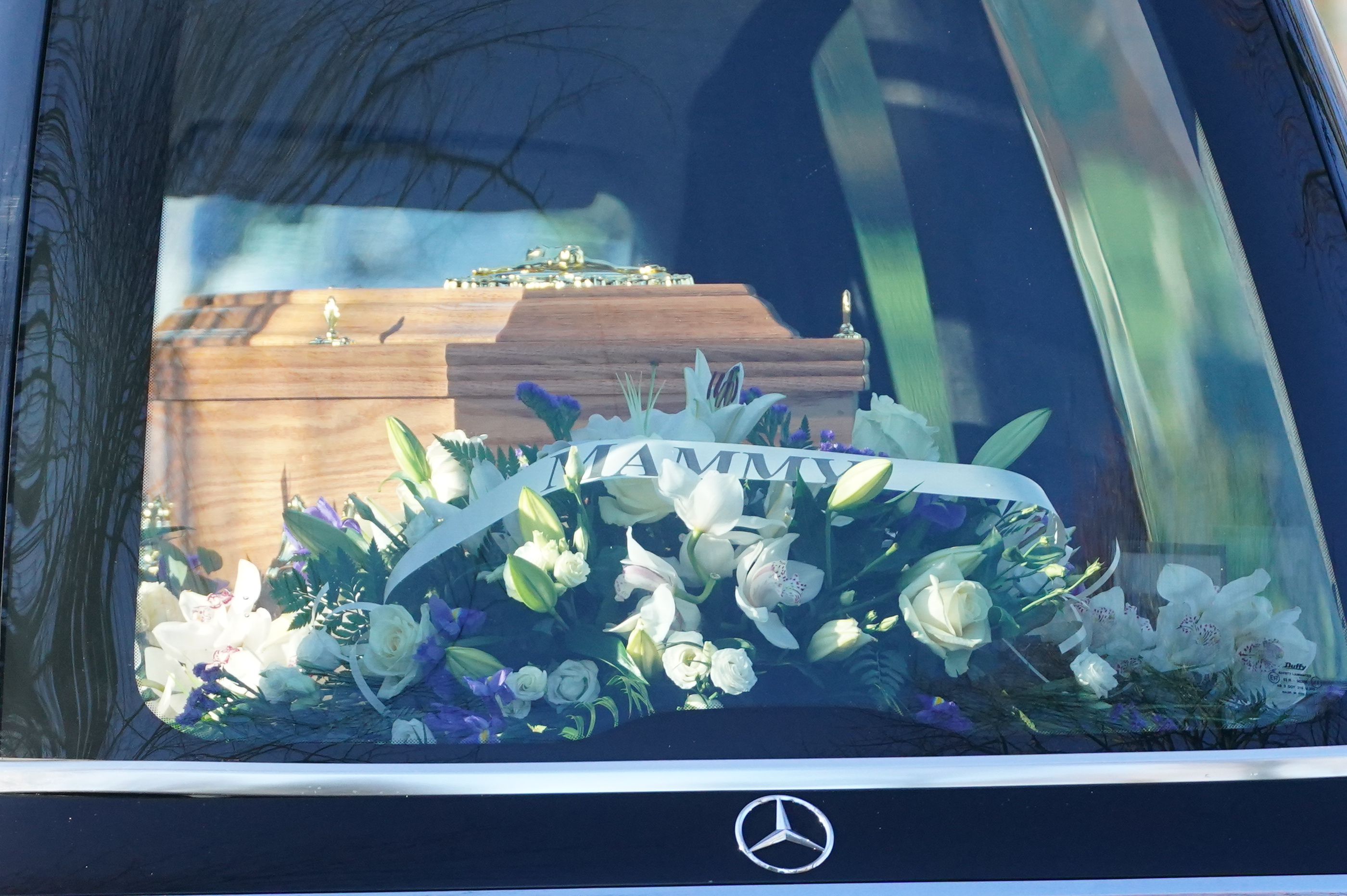 A coffin in a hearse
