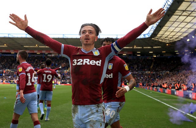 Jack Grealish celebrates after scoring the opening goal for Aston Villa