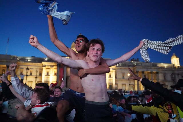 Fans in Trafalgar Square celebrate England’s second goal (