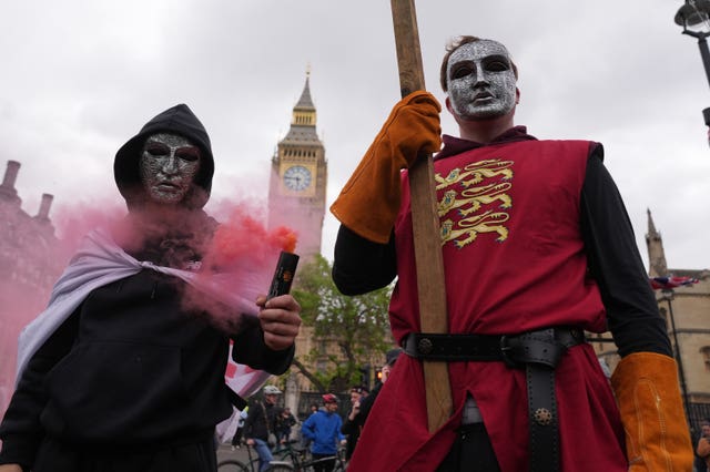 People take part in Tommy Robinson’s Unite the Kingdom march
