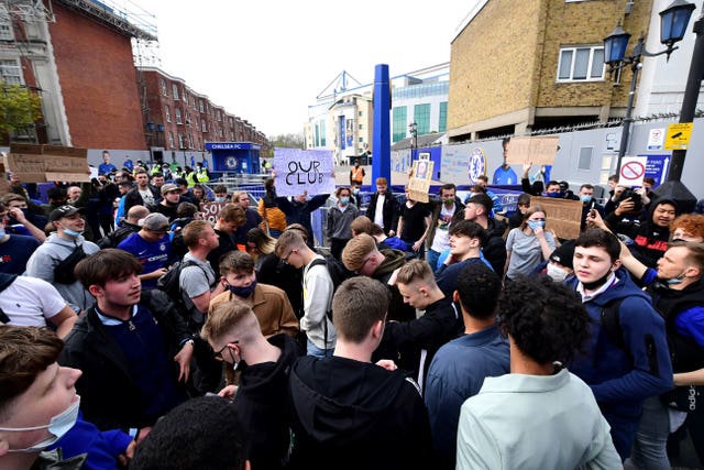 Fans protest against Chelsea’s involvement in the new European Super League outside Stamford Bridge