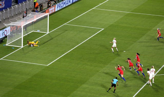 Steph Houghton, right, sees her penalty saved by Alyssa Naeher