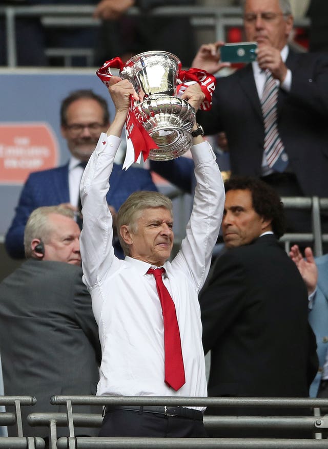 Arsene Wenger has lifted the trophy three times under the arch