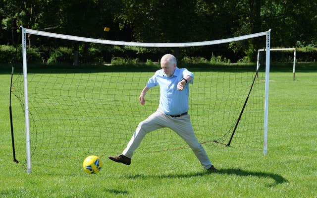 A a penalty kick from a child gets past Labour Party leader Jeremy Corbyn during a visit to Hackney Marshes Football Pitches during the 2017 General Election campaign. (John Stillwell/PA)